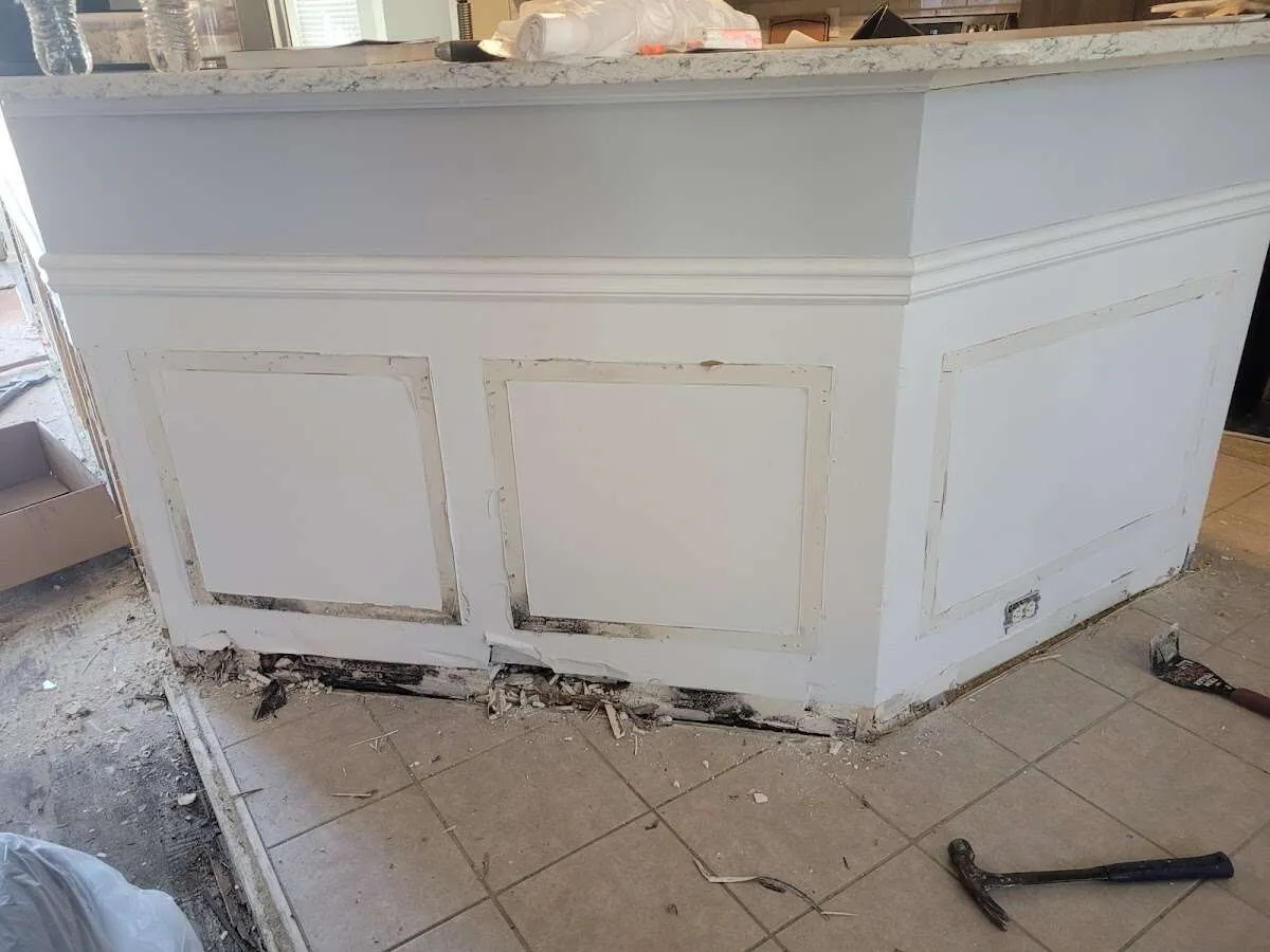 Water damage and mold on kitchen during Storm Damage Restoration in New Brighton